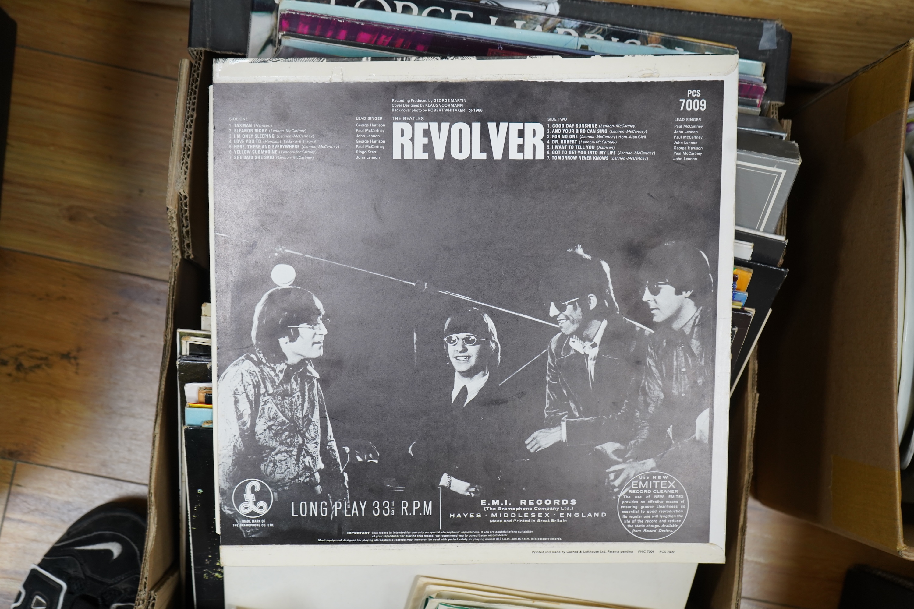 A collection of Beatles related LP's and singles, 36 LPs and a John Lennon box set, including; the ‘White Album’, a side loading issue, numbered 0111352, Revolver, Abbey Road, Sgt. Pepper, Let It Be, Beatles For Sale, Wi